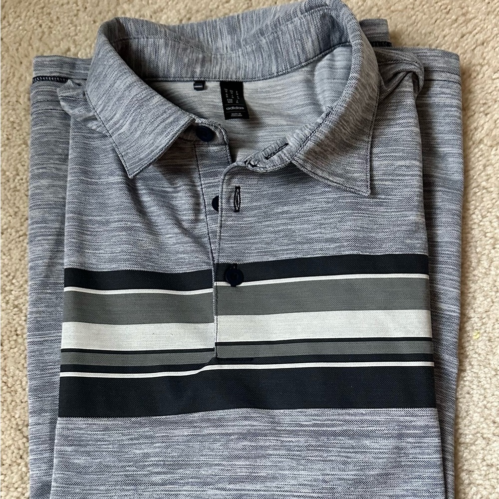 Adidas Men’s Medium golf shirt.
